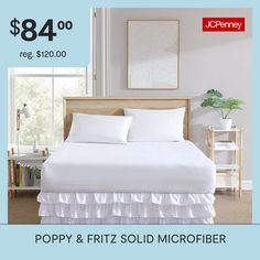 a bed with white sheets and ruffled bedspread for $ 84 00 reg $ 120 00