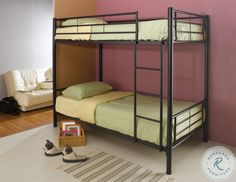 a bunk bed in a room with pink walls