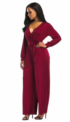 This simply chic jumpsuit is simply perfect. Featuring a wrap-style front with long cuffed sleeves, flare legs, a cinched sash-belted waist and a plunging v-neckline. This jumpsuit pairs perfectly with heels, wedges, sandals or booties. Made with a polyester and spandex blend for comfort and style. Comes in four fabulous colors from which to choose. Womens Suit, Chic Jumpsuit, Plus Size Fall Outfit, Wrap Jumpsuit, Jumpsuit Chic, Wedges Sandals, Simply Chic, Suit And Tie, Wide Leg Jumpsuit