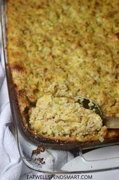 a casserole dish with a spoon in it