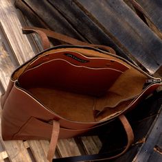 "DIMENSIONS: 17.5\"H x 18\"W x 5.5\"D (Bottom) | 44.5 cm H x 45.7 cm W x 14 cm D Antique Tan Women Leather Tote Bag with Zipper Closure with External Pocket, Made with Single Uncut piece of leather skin. Perfect for use as a stylish shopper or day bag. Made with thick yet soft quality top grain nappa cowhide leather. 1.1mm - 1.2mm thick. Carry handles are made of Vegetable tanned cowhide leather. Incredibly soft and supple and fairly lightweight but nonetheless, durable. It will continue to deve Leather Satchel With Interior Card Slots For On-the-go, Brown Briefcase With Zipper Pocket For Everyday Use, On-the-go Leather Shoulder Bag With Interior Card Slots, Leather Briefcase With Zipper Pocket For Daily Use, Brown Tote Laptop Bag With Zipper, Brown Tote Laptop Bag With Zipper Closure, Brown Tote Laptop Bag With Zipper Pocket, Everyday Brown Satchel With Interior Card Slots, Brown Shoulder Bag With Interior Card Slots For Everyday