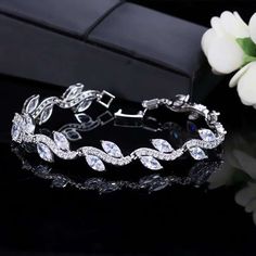 If you re looking for a fine jewelry which looks sepecial, precious stone please consider cubic zirconia in Wedding Bracelet Cubic Zirconia Bracelet, Gemstone Bangle, Leaf Bracelet, Bridal Event, Wedding Party Jewelry, Wedding Jewelry Bracelets, Wedding Bridal Jewellery, Bridal Bracelet, Bangles Jewelry