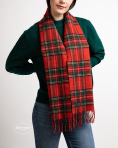 Elevate your winter wardrobe with our Royal Stewart Tartan Wool Scarf, a pure wool accessory that effortlessly combines style and warmth. This timeless tartan scarf, in classic Christmas shades of red, is the perfect choice for achieving a stylish layered look during the festive season. Add a touch of regal style to your wardrobe with our Royal Stewart Tartan Wool Scarf. This stylish accessory is a must-have for anyone looking to elevate their outfit, and it's perfect for all seasons. The Royal Stewart tartan holds a special significance as it is the personal tartan of Queen Elizabeth II and is associated with the prestigious Royal House of Stewart. Embrace the royal connection and showcase your impeccable taste with this iconic tartan design. Woven with natural lambswool of the highest qu Classic Plaid Scarves For Winter, Classic Red Scarves For Winter, Red Wool Winter Scarves, Red Wool Scarves For Winter, Classic Winter Scarves For Cold Weather, Tartan Scarf Outfit, British Dress, Beautiful Coastline, Tartan Plaid Christmas