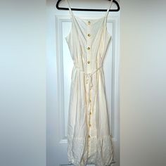 White/ Cream/ Off White Front Tie Long, Button Down Maxi Dress Never Worn Casual White Maxi Dress With Button Closure, White Button-up Maxi Dress For Vacation, Casual White Maxi Dress With Buttons, White Maxi Dress With Buttons For Spring, White Sleeveless Sundress With Button Closure, White Sleeveless Maxi Dress With Button Closure, White Buttoned Midi Dress For Brunch, White Midi Dress With Button Closure For Vacation, White Sleeveless Midi Dress With Button Closure