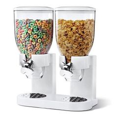 two machines filled with cereal and sprinkles on top of eachother