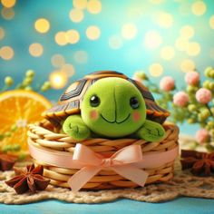 a small stuffed turtle sitting in a basket next to an orange slice and starfish