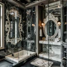 a fancy bathroom with marble and glass walls