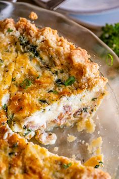 a close up of a plate of food with broccoli and cheese on it