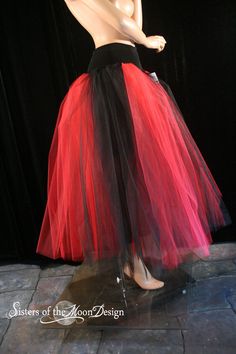 "Handmade from 25yards two layers of soft smooth black and red striped Bridal tulle that has been gathered and serged to the 5\" wide black stretch fabric waistband. We also attached a 12\" black stretch fabric underskirt so that the top of the skirt can no be seen through! This skirt is not made yet, It is made when ordered! Measurement: Sizes go by smallest waist size tutu will fit to largest Hips tutu fits over XSmall 24\"-34\"inches Small 26\"-38\"inches Medium 30\"-40\"inches Large 34\"-48\ Black Tulle Full Skirt Petticoat, Black Crinoline Skirt For Wedding, Wedding Black Tulle Petticoat, Fitted Red Tulle Petticoat, Halloween Dance Tulle Skirt, Red Fitted Skirt For Halloween, Fitted Red Skirt For Halloween, Red Fitted Tulle Petticoat, Halloween Costume Tulle Skirt