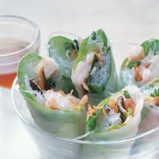 some food is in a glass bowl on a table