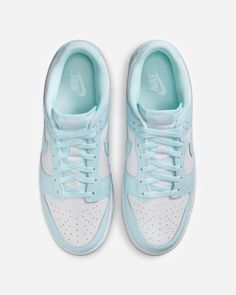 Men's Nike Dunk Low in White and Glacier Blue. This low-top sneaker features a leather base with leather overlays on the mudguard, eyeguard and collar. A jacquard nylon logo patch is stitched on the tongue with additional branding on the heel counter. Shoe Widgets, Shoes For School, Bold Shoes, Back To School Shoes, Pretty Shoes Sneakers, Shoe Wishlist, Casual Preppy Outfits