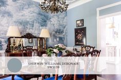 the dining room is decorated in blue and white