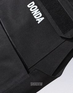 Type: Techwear vest Materials: Polyester Design: Techwear, Streetwear, Grunge Machine washable: 30°C (86°F) Donda bulletproof vest When it comes to pushing the boundaries of fashion and functionality, the Donda Bulletproof Vest stands unrivaled. Popularized by rap icon Kanye West, this vest will enhance your streetwear vibes. The unique "Donda" branding and iconography showcase a level of prestige and thoughtfulness that few fashion items can rival. Whether you're heading to a high-stakes meetin Sleeveless Techwear Vest, Functional Black Tank Vest, Sleeveless Cotton Techwear Vest, Tactical Sleeveless Vest For Streetwear, Functional Sleeveless Vest For Streetwear, Functional Sleeveless Vest For Workwear, Functional Sleeveless Workwear Vest, Techwear Vest, Bulletproof Vest