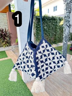 "This shoulder bag is hand brocaded, super elaborate craft on hemp linen cloth.  100% handmade. High quality of the hemp linen cloth (not ordinary hemp)  The shape is so unique. The tassels make it look cute. Give you a elegant look but casual style.   This is the \"Don't miss\" item for bags in our shop  I guarantee that you will not be disappointed. :) Sizes : Width 40 cm, height 26 cm, open space is 20 cm. ( when you're holding the width will be smaller since it will come down) Care instructions: wash by hand with the gentle fabric laundry soap and let it dry naturally." Embroidered Rectangular Canvas Beach Bag, Embroidered Crochet Tote Bag For Vacation, Handmade Cotton Shoulder Bag For Market, Handmade Cotton Shoulder Bag, Eco-friendly Handmade Canvas Bag For Summer, Handmade Blue Jute Bags, Rectangular Embroidered Crochet Bag For Vacation, Bohemian Handmade Natural Canvas Bag, Embroidered Rectangular Crochet Bag For Summer