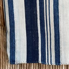 The Deep Indigo Stripe Throw is a one of a kind vintage African textile. Hand woven in 100% cotton in a variegated indigo and natural stripe. Use caution around lighter colored pieces, indigo dye may transfer to lighter fabrics. Measures 44 x 58. A Life Well Lived, Tile Rug, Deep Indigo, Striped Throw, Indigo Dye, Life Well Lived, Hand Work, Fabric Rug, Vintage Textiles