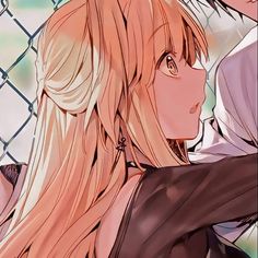 an anime character with long blonde hair standing in front of a chain link fence and looking into the distance