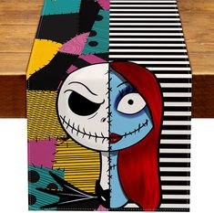 a skateboard with the image of jack and sally from the nightmare before it's been painted