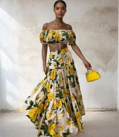 This set features a beautiful off-shoulder top with a print of brilliant yellow roses, paired with a flowing long skirt. Perfect for any occasion, this set combines elegance and freshness for a stunning look.    Two-piece set includes a long skirt and matching top   Lightweight and breathable fabric  Available in different sizes  Comfortable fit with an elastic waistband  Perfect for spring and summer wear  Easy to mix and match with other wardrobe pieces Top And Long Skirt, Cruise Clothes, Long Skirt Set, Haldi Outfit, Floral Two Piece, Vintage Florals, Comfortable Outfit, Wardrobe Pieces, 2 Piece Skirt Set