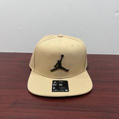 Brand - Jordan Hat Type - Snapback Hat Model - Pro Cap Style Code - Fd5184 200 Color - Tan & Black Condition - Brand New Age - Adult Sizes Available; Medium|Large Beige Adjustable Snapback Hat With Visor, Brown Flat Bill Sports Hat, Adjustable Beige Snapback Hat With Visor, Adjustable Beige Snapback Visor Hat, Brown Flat Brim Sports Hat, Sports Flat Bill Hat In Brown, Adjustable Beige Visor Snapback Hat, Brown Flat Brim Baseball Cap For Sports, Brown Flat Brim Snapback Hat For Sports