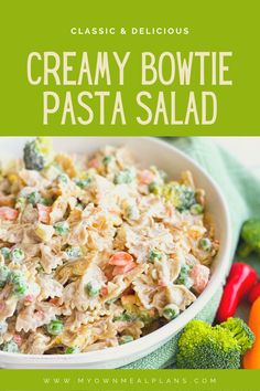 creamy bowtie pasta salad in a white bowl