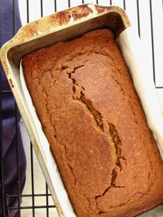 a loaf of bread sitting on top of a cooling rack