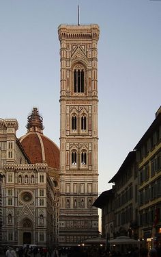 an old building with a clock tower in the middle