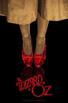 the wizard movie poster is shown with red shoes on it's feet and legs