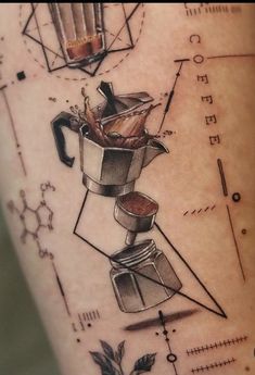 a tattoo on the leg of a person with an image of a blender and coffee pot