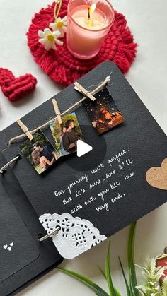 an open card with pictures and hearts on it