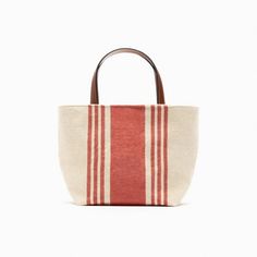 Zara Fabric Mini Tote Bag Brand New With Tag Fabric Tote Bag With A Striped Print On The Exterior Crossbody Strap. Zip Closure Height X Length X Width 16 X 25 X 12 Cm / 6.2 X 9.8 X 4.7" Outer Shell Main Fabric 100% Cotton Shoulder Strap 100% Polyethylene Lining 100% Cotton Red Bucket Bag With Top Carry Handle, Everyday Red Bucket Bag With Top Handle, Everyday Red Bucket Bag With Top Carry Handle, Red Bucket Bag With Top Carry Handle For Everyday, Red Double Handle Bucket Bag With Top Carry, Zara Tote Bag With Leather Handles, Red Bucket Bag With Top Carry Handle For Travel, Chic Red Bucket Bag With Top Carry Handle, Red Travel Bucket Bag With Top Carry Handle