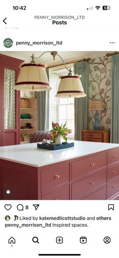 a kitchen island with two lamps above it and the words penny - morgan ltd below