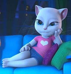 a cartoon cat sitting on top of a blue couch