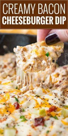 a cheesy bacon cheeseburger dip is being lifted with a spatula