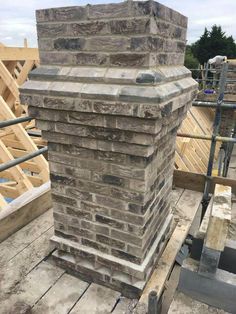 a large brick chimney on top of a building