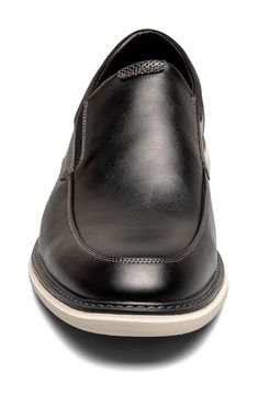 Clean topstitching lends handsome style to this sleek slip-on fitted with a cushioned footbed and shaped by a classic moc toe. Synthetic upper and lining/rubber sole Imported Black Moc Toe Slip-ons With Cushioned Footbed, Classic Synthetic Moc Toe Slip-ons, Black Moc Toe Slip-ons With Stitched Sole, Black Slip-ons With Moc Toe And Rubber Sole, Black Slip-ons With Cushioned Footbed And Moc Toe, Handsome Style, Nordstrom Rack, Rubber Sole, Slip On