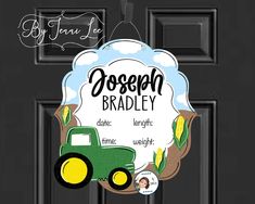 a door hanger that says joseph bradley with a tractor and farm scene on it