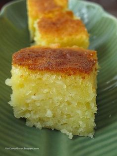 two pieces of cake on a green plate