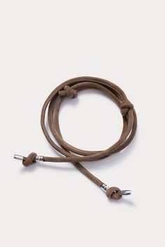 Knotted tubular self-tie belt in durable suede with silver-toned hardware. Looks great styled with coats. 100% Leather Made in Peru Wedge Heel Boots, Resale Shops, Clog Sandals, Belt Tying, Loafer Mules, Short Jumpsuit, Knit Skirt, Denim Pant, Tie Belt