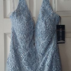 Brand New. Never Been Worn. Light Blue, Size 12 Sequin Lace Halter Evening Gown,Pageant Gown, Prom Gown, Wedding Guest. Absolutely Breath Taking Ice Blue. Breath Of Fresh Air Look. Only Reason I'm Selling Is I Had To Get Another Size In This Same Dress. It Is A Stunner And A Keeper. Evening Gown Pageant, Gown Wedding Guest, Pageant Gown, Blue Evening Gowns, Pageant Gowns, Sherri Hill Dresses, Gown Prom, Sherri Hill, Gown Wedding