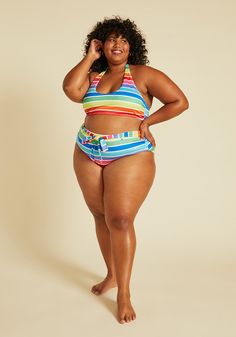 With an adjustable sash tie-front at the waist and a figure-flattering cut, this rainbow striped high-waisted bikini bottom from our ModCloth namesake label is all about elevating the details. Featuring an all over print of neon-hued rainbow stripes, contrasted by thin white stripes throughout, this swimsuit bottom is without a doubt a must-have in your latest set-up in swimwear rotation. Shell: 88% Polyester, 12% Spandex. Lining: 86% Nylon, 14% Spandex. Hand wash. Fully lined. Imported | ModClo Vintage Style Swimwear, Casual Dresses Plus Size, Midi Dress Plus Size, Resort Outfit, Rainbow Outfit, Tunic Hoodie, Vintage Swimwear, Cute Bathing Suits, Casual Rompers