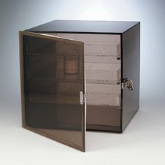 an open metal cabinet on a white background