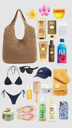 the contents of a beach bag are laid out