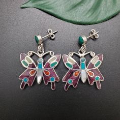 Visit our online shop at: Etsy.com/shop/925ForHer *sterling silver earrings / butterfly shape *studs / post earrings *southwestern jewelry *multicolor inlay / pattern inlay *calibrated pre-cut stones: inlay including mother of pearl, spiny oyster, malachite, sodalite *back of jewelry items are all covered / do not show the back of stones *all jewelry items are made to ship, slight variations in stones will occur compared to pictures. *size of a penny is 19mm or a dime is 18mm in diameter for comparing the size with jewelry items. *handcrafted in the USA *free small convenient gift box *free shipping in the US, ship from the US without insurance. *most orders will be shipped the same day or within 24 hours from the time of placing orders during USPS working hours. *seller provide one-time F Sterling Silver Earrings With Butterfly Charm, Sterling Silver Jewelry With Butterfly Charm Drop Earrings, Sterling Silver Drop Earrings With Butterfly Charm, Multicolor Butterfly Earrings For Pierced Ears, Silver Sterling Butterfly Earrings, Silver Sterling Silver Butterfly Earrings, Butterfly Shaped Sterling Silver Earrings, Multicolor Butterfly Earrings, Sterling Silver Butterfly Pierced Earrings