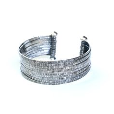 "Engraving oxidized sterling silver stack cuff bracelet(FBA) Bracelet measure: 6\" L (end to end) X 1.3\" W Weight:49.36 g All items are hand crafted by me, Sirilak Samanasak in Chiang Mai, Thailand. Each piece is one of a kind and the item pictured is the exact item that will ship. Every gemstone is hand selected for its quality and beauty and are hand set into settings and final jewelry pieces. JEWELRY CARE Most jewelry in my shop is sterling silver which can easily be cleaned and re polished Unique Antique Silver Bracelet With Oxidized Finish, Unique Antique Silver Bracelets With Oxidized Finish, Unique Metal Bracelet With Oxidized Finish, Elegant Metal Cuff Bracelet With Oxidized Finish, Elegant Oxidized Metal Cuff Bracelet, Adjustable Modern Gunmetal Jewelry, Modern Adjustable Gunmetal Jewelry, Antique Silver Metal Bangle With Oxidized Finish, Unique Oxidized Cuff Bracelet Bangle