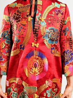 "Chinese Brocade Jacket/ Chinese Embroidered Opera Coat/ Chinese Embroidered Jacket/ Red Satin Jacket/ 60's Chinese Coat/ Size S-M Incredible satin Chinese jacket in the most vibrant hues. Bold red with multi-colored embroidery accentuated by yellow frog closures. In excellent condition. A collector's item. Fully lined. Size tag reads size 10. Model is 5'4\" and a size 4 for scale. Please see exact measurements below. Item measured while flat, double where applicable, i.e. waist, hips. Shoulder Traditional Red Outerwear With Stand Collar, Vintage Red Embroidered Outerwear, Red Vintage Outerwear With Floral Embroidery, Vintage Red Outerwear With Floral Embroidery, Vintage Red Outerwear With Stand Collar, Traditional Red Outerwear With Floral Embroidery, Chinese Jacket, Chinese Brocade, Greek Goddess Dress