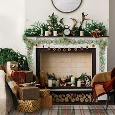 a living room filled with furniture and a fire place covered in christmas decorations on top of a mantel