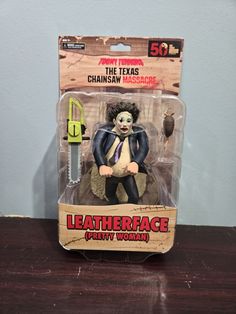 an action figure is shown in the packaging for leatherface cultin'd world