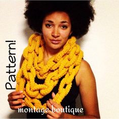 a woman wearing a yellow knitted scarf with the words montage boutique on it