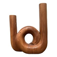 a wooden object that is shaped like the letter j