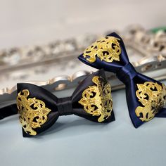 100% Hand-made High-quality bow tie FREE US Domestic shipping Made with high-quality fabric with gold decorative applique Rare and Unique Bow.  Pre-tied with an adjustable neck strap Measurement approx. 10cm L x 6 cm H Perfect for wedding or any special occasion *Presented in a gift box. Best gift for your love one or yourself! Satin Ties With Decorative Bow For Party, Party Satin Ties With Decorative Bow, Gold Bow Tie For Formal Occasions, Elegant Gold Bow Tie For Formal Occasions, Gold Bow Ties For Black Tie Events, Fitted Gold Bow Tie And Suit Accessories, Gold Elegant Bow With Tie Back, Gold Bow With Tie Back For Wedding, Formal Gold Suit And Tie Accessories With Decorative Bow